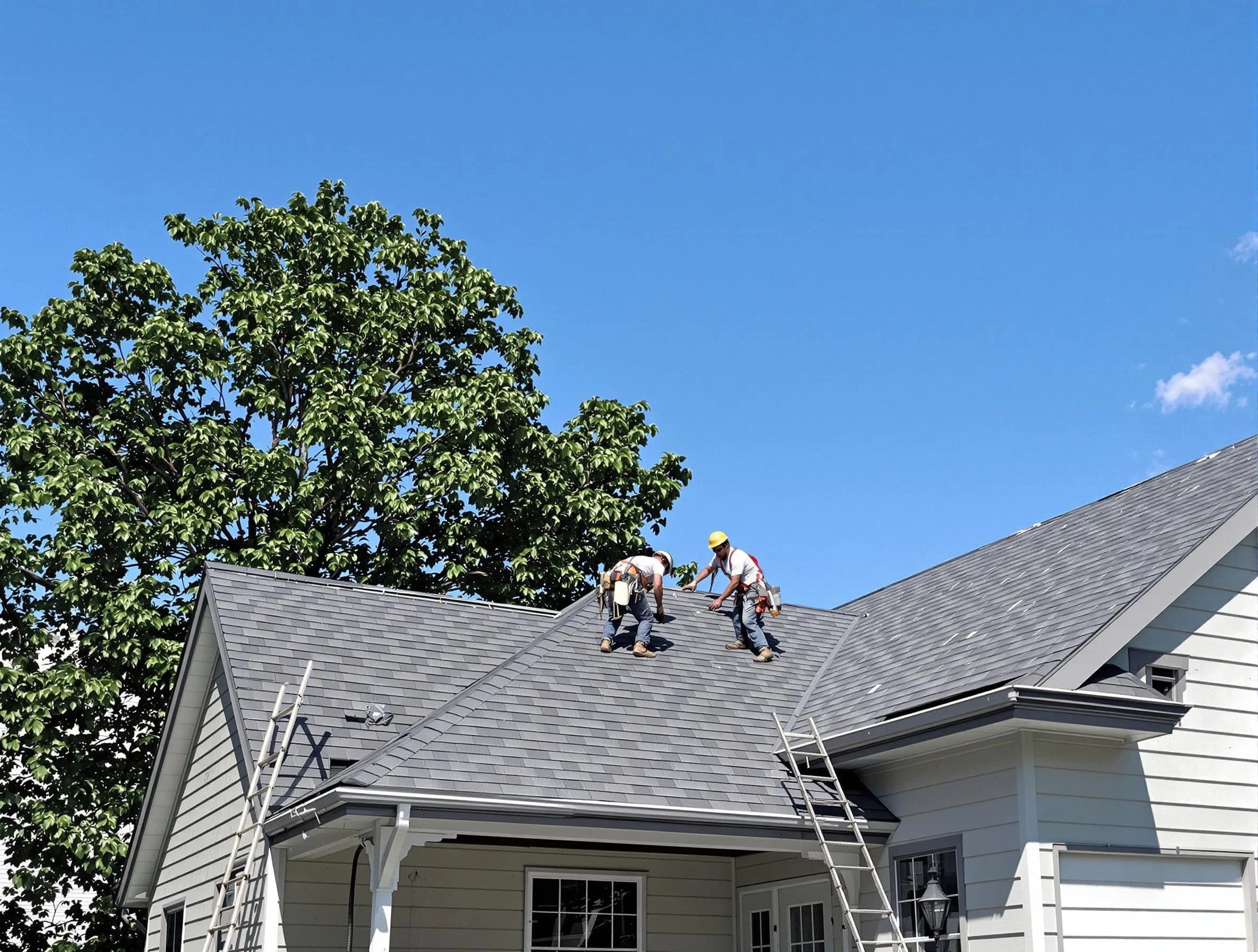 Bedford Roofing Company crew finalizing a roof installation in Bedford, OH