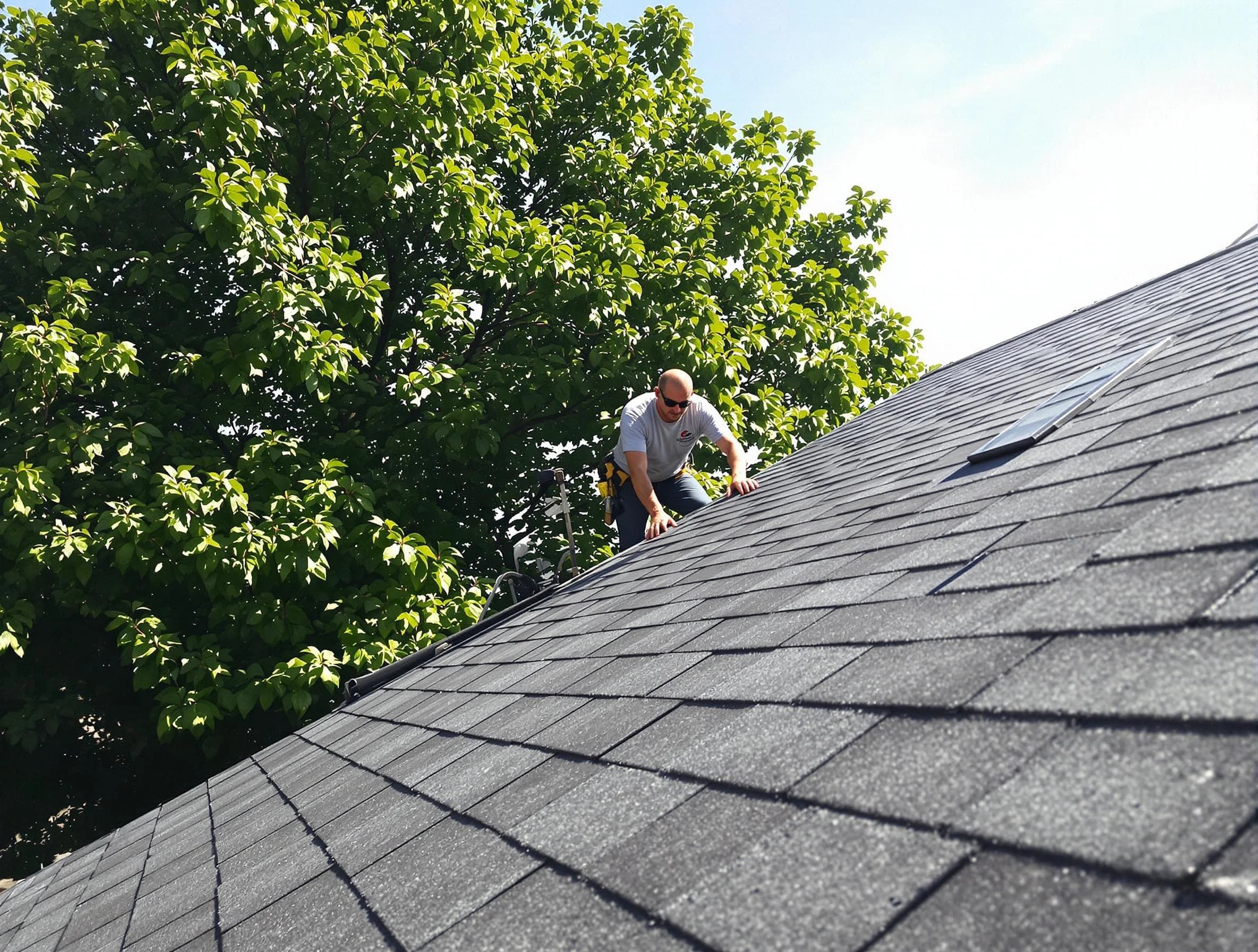 Certified roofers from Bedford Roofing Company working in Bedford, OH